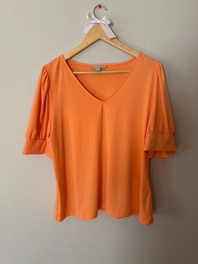 Women's V-Neck Short Puff Sleeve Blouse in Bright Orange